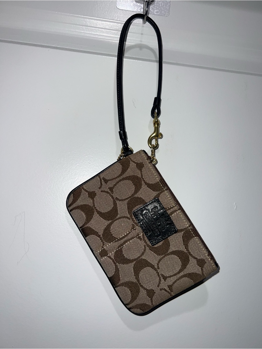 Coach Brown Signature Canvas wristlet with Black Trim